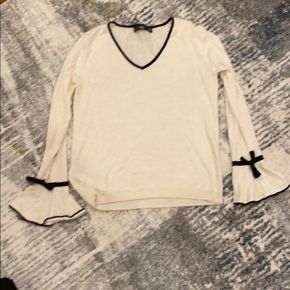 White and black sweater